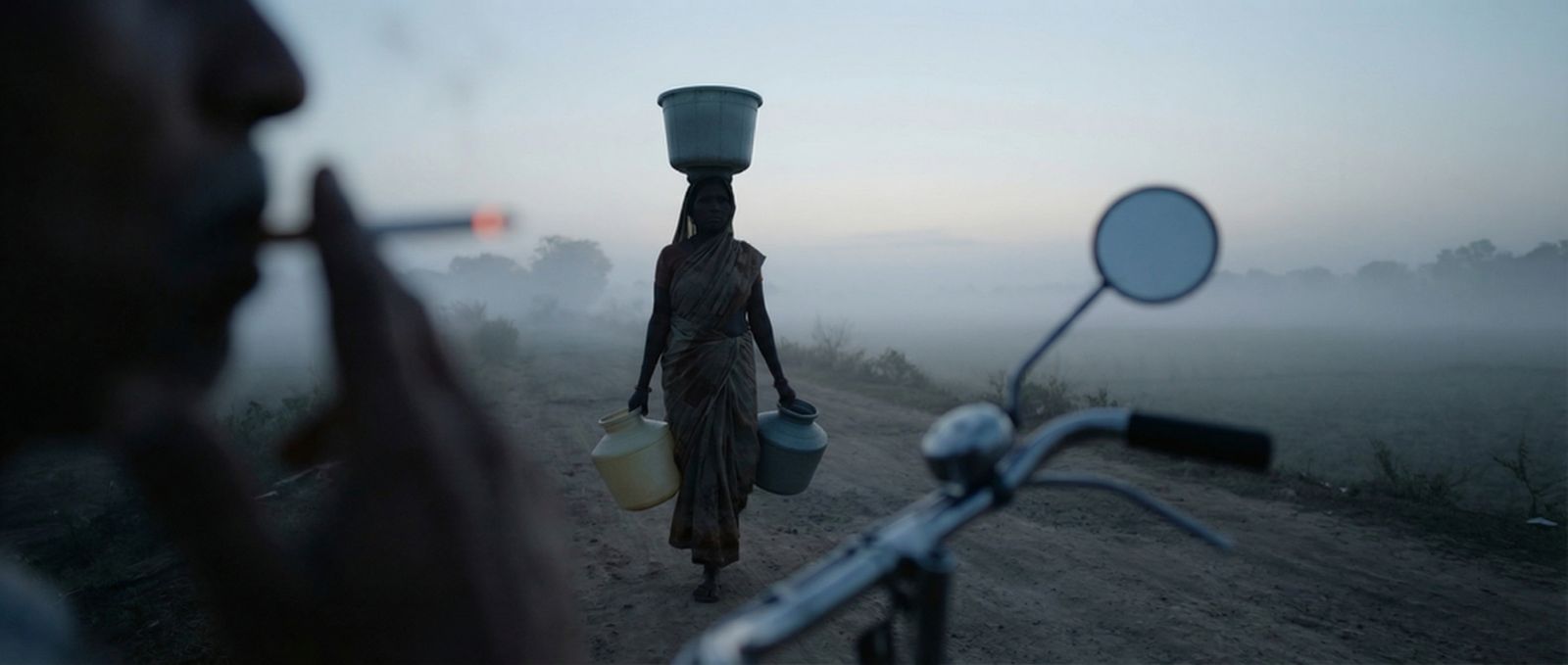 Carrying water at dawn